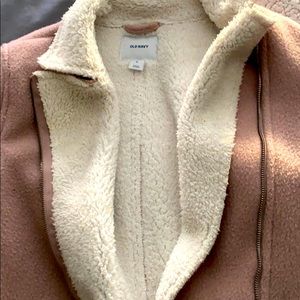 A light pink coat.